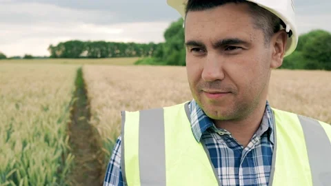 Slow motion Close-up Portrait A Farmer Looks at the Camera after a Working Day Stock Footage 203816963