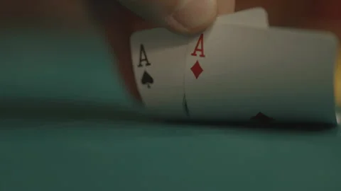 Slow motion close-up POV of hand looking at double Ace Stock Footage 334037519