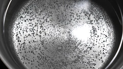 Slow motion close up pre-boiling water Stock Footage 339805873