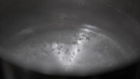 Slow motion close up pre-boiling water. Stock Footage 339805913