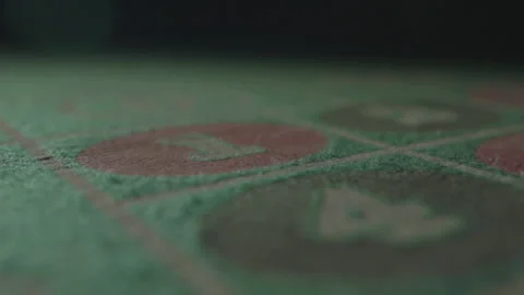 Slow motion close-up red dice landing on gaming table Stock Footage 335699897