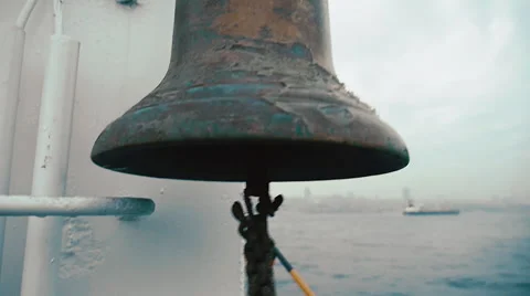 Slow motion close up of a rusty bell on a ferry in bosphorus Stockbeeldmateriaal 51703024