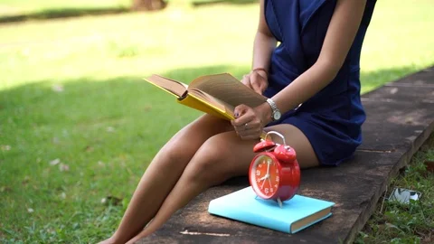 Slow motion Close up scene of Asian women are reading diary books or research Stock Footage 127081817
