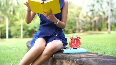Slow motion Close up scene of Asian women are reading diary books or research Stock Footage 127082323