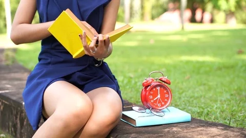 Slow motion Close up scene of Asian women are reading diary books or research Stock Footage 127083230
