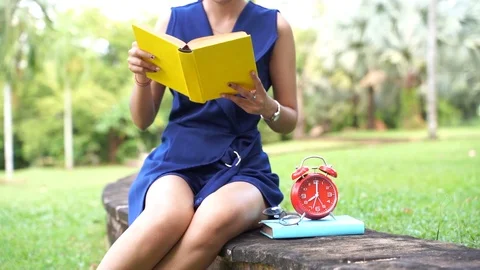 Slow motion Close up scene of Asian women are reading diary books or research Stock Footage 127083412
