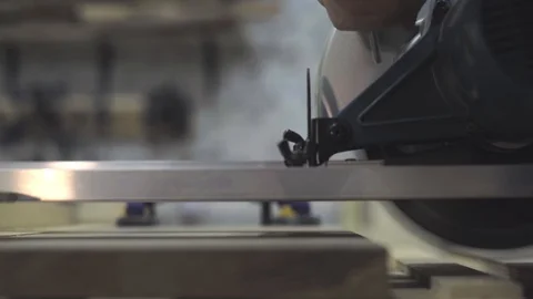 Slow Motion: A close-up of a sewing circle that cuts the board. Stock Footage 102784924