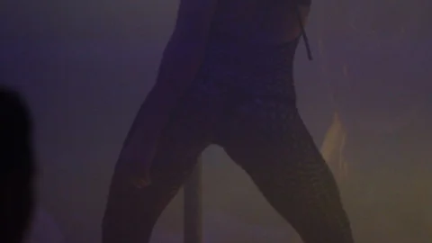 Slow motion close up of a sexy lap dancer body dancing in a night club Stock Footage 104618069