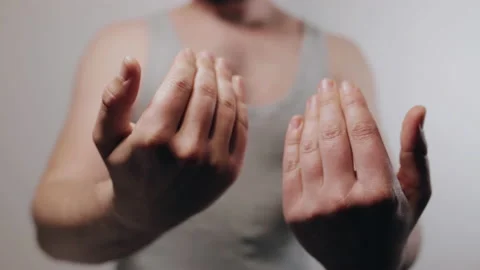 Slow motion close up shoot of strong man with beckon hands gesture Stock Footage 231683701