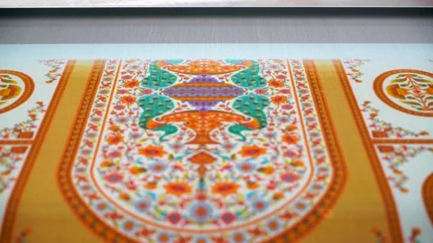 Slow motion close up shot of automatic color printing machine in textile fac Stock Footage 199270987