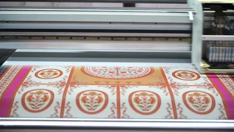 Slow motion close up shot of automatic color printing machine in textile fac Stock Footage 199271028
