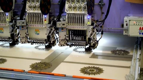 Slow motion close up shot of automatic embroidery machine with multiple head Stock Footage 199271031