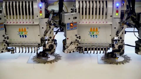 Slow motion close up shot of automatic embroidery machine with multiple head Stock Footage 199271079
