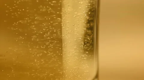 SLOW MOTION: Close-up shot of beer with bubbles floating up. Concept of relax Stock Footage 52153148
