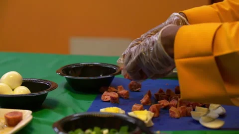 Slow Motion Close-Up Shot Of Chef Wearing Plastic Gloves Preparing Food In Stock Footage 237015312