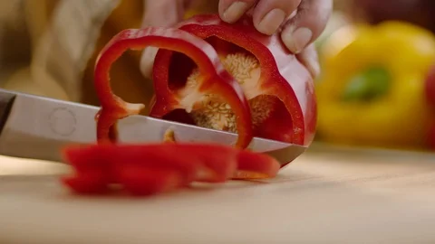 Slow Motion Close Up Shot of Cutting Vegetables Stock Footage 121829704