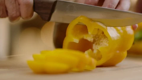 Slow Motion Close Up Shot of Cutting Vegetables Stock Footage 121829713