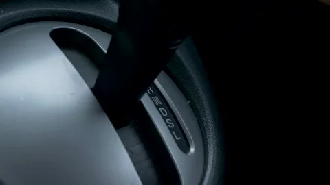 Slow motion close-up shot of driver's hands pulling gears lever gearbox Stock Footage 276515537