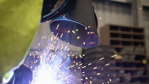 Slow motion close-up shot of funnel extracting fume from welding operation. Stock Footage 93097066