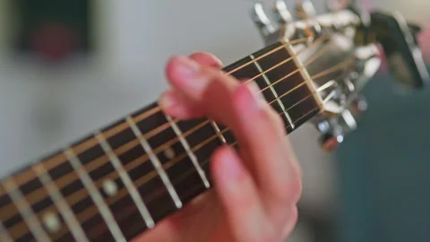 Slow motion close up shot of guitar playing Video stock 255124302