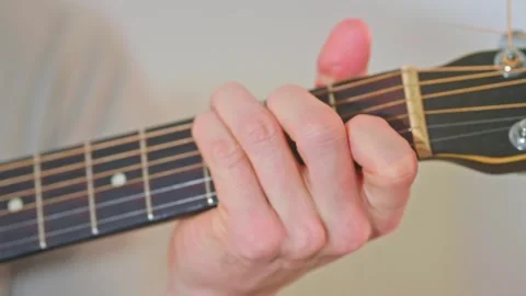 Slow motion close up shot of guitar playing Stock Footage 255127722