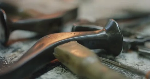 Slow motion close up shot of hammer reflecting fire. Stock Footage 71934639