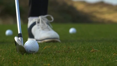 Slow motion close up shot of iron striking ball Stock Footage 104563913