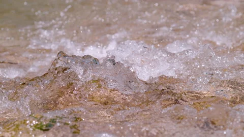SLOW MOTION, CLOSE UP: Small rapids of wild mountain river sparkling in the sun Stock Footage 234976197