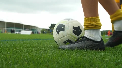 Slow motion close up of soccer ball during match Stock Footage 249390867