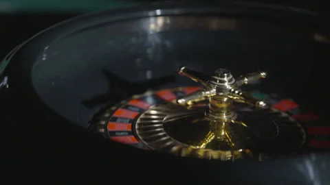 Slow motion close-up spinning roulette with ball inside Stock Footage 335700126