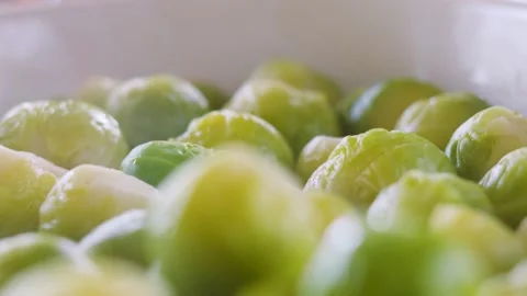 Slow Motion Close-Up of Steaming Fresh Brussels Sprouts Stock Footage 326019468