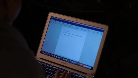 Slow motion close-up of student writing on her laptop computer during class Stock Footage 85038939