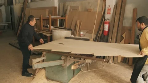 Slow Motion Close Up of Table Saw Cutting Wood on Construction Site Stock Footage 167709089