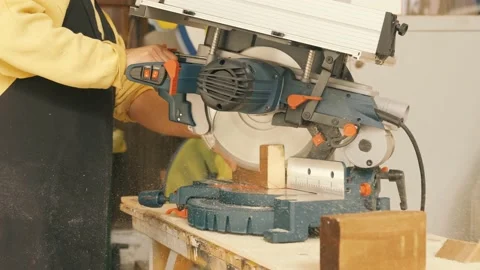 Slow Motion Close Up of Table Saw Cutting Wood on Construction Site Stock Footage 167709798