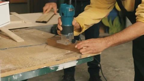 Slow Motion Close Up of Table Saw Cutting Wood on Construction Site Stock Footage 167709840