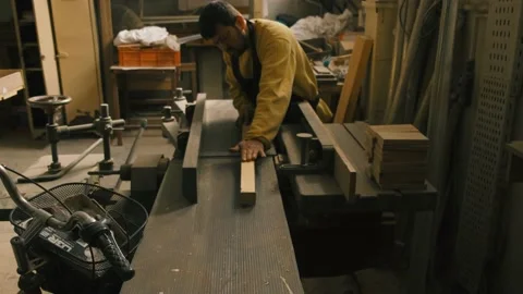 Slow Motion Close Up of Table Saw Cutting Wood on Construction Site Stock Footage 167710148