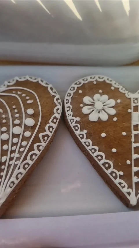 Slow motion close-up of traditional Czech gingerbread cookies decorated Stock Footage 312860899