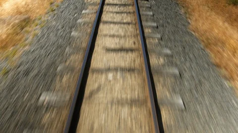 Slow motion close up train tracks moving from train Stock Footage 88381675