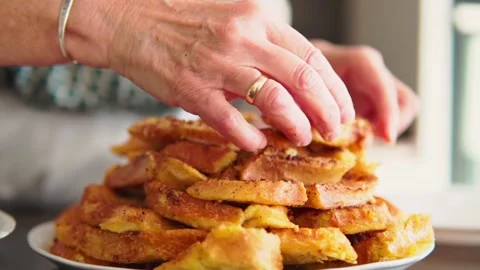 Slow Motion close up video of chef hands serving traditional spanish torrijas. Stock Footage 263342159
