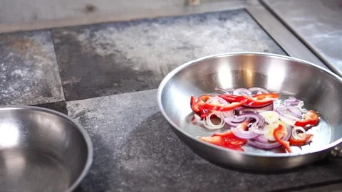 Slow motion close up view on fresh cut vegetables red hot chili pepper onion Stock Footage 105457397