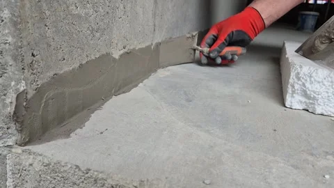 Slow Motion Close Up of Wall Repair with Mortar Stock Footage 338192146