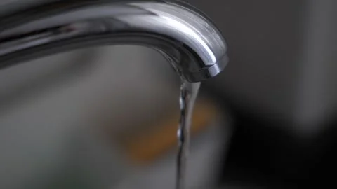 Slow motion close up water falling tap Stock Footage 339805874