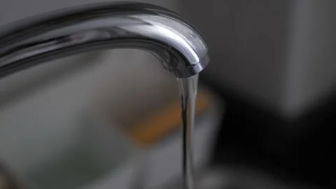 Slow motion close up water falling tap Stock Footage 339805875