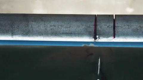 Slow motion Close up water leak drop from steel pipe. Stock Footage 48185473