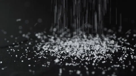 Slow Motion Close Up White Sugar Crystals Falling down. Stock Footage 174279151