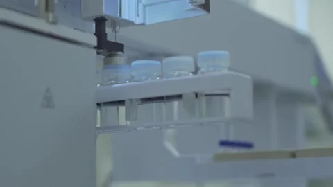 Slow motion close-up of working liquid spectroscopy machine at laboratory 스톡 동영상 255861897
