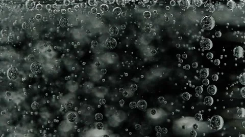 Slow motion closeup abstract water bubbles on black background, macro soda drink Vídeos de archivo 162365704