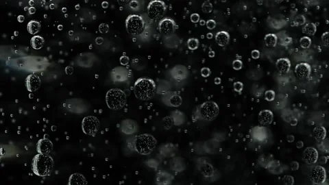 Slow motion closeup abstract water bubbles on black background, macro soda drink Stock Footage 165794243