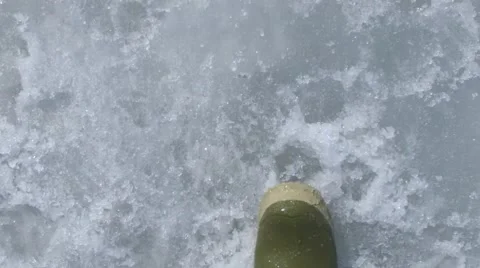 Slow motion closeup of boots walking on snow pov Stock Footage 61376099