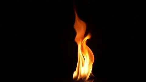 Slow motion closeup campfire burn on black background, fire flame design element Stockbeeldmateriaal 147640608